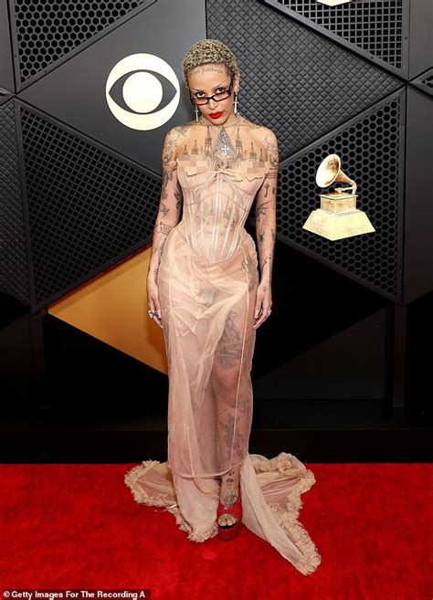 doja cat nude dress|Doja Cat suffers a nip slip in VERY racy sheer corset dress and。